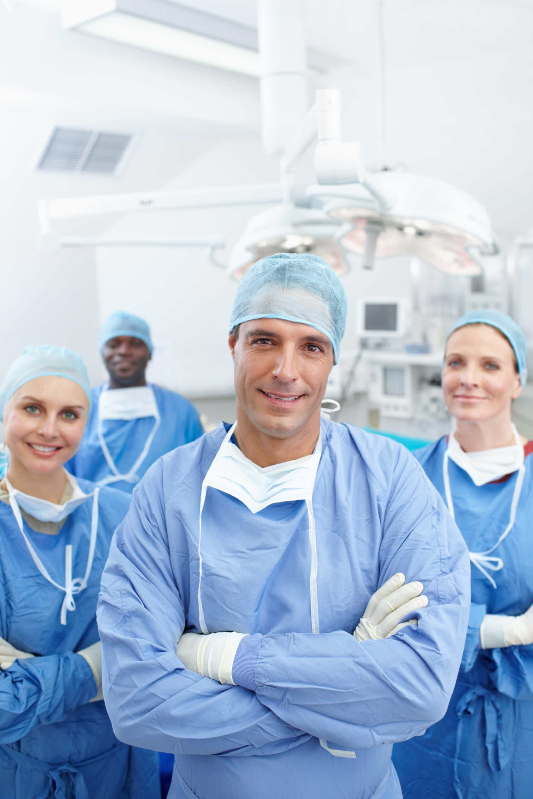 Portrait of a diverse, confident and happy team of medical surgeons